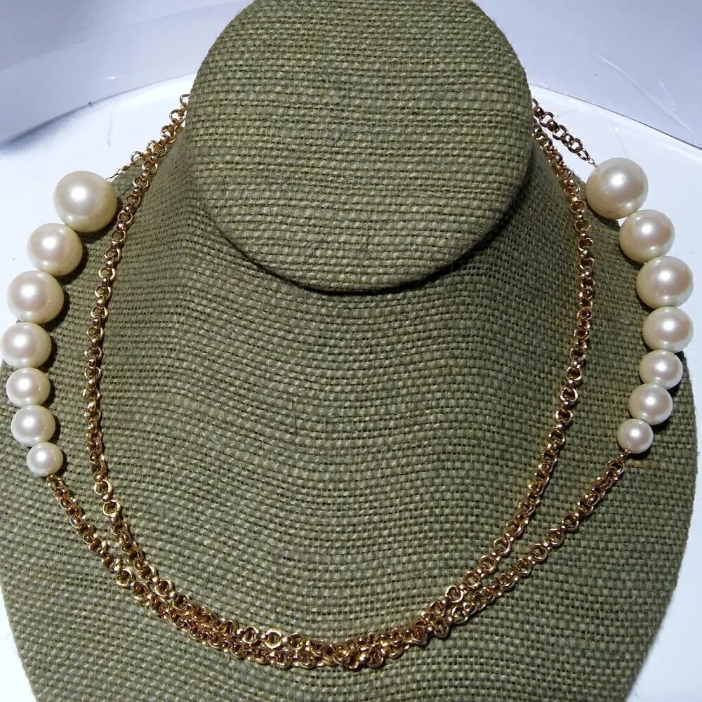 Women`s gold tone faux pearl rolo chain necklace.